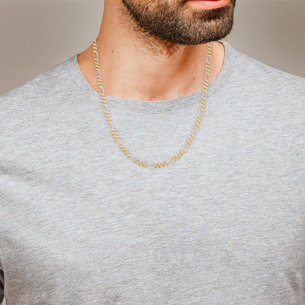Collar de tres eslabone por uno en oro dos tonos 14 kilates.