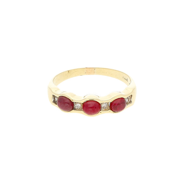 Anillo diseño especial con rubíes y circonias en oro amarillo 14 kilates.