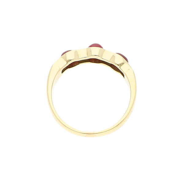 Anillo diseño especial con rubíes y circonias en oro amarillo 14 kilates.