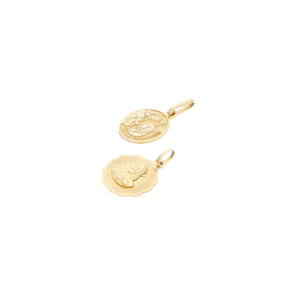Dos medallas diseño especial en oro amarillo 14 kilates.