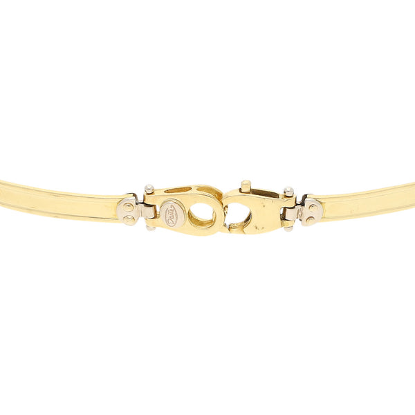 Pulsera eslabón articulado en oro dos tonos 18 kilates.
