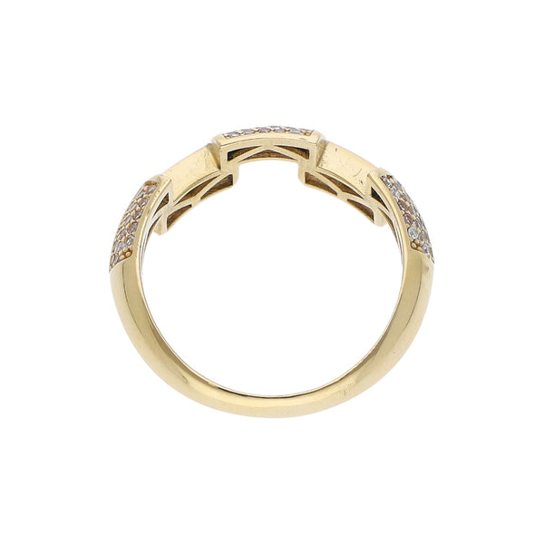 Anillo estilizado con sintéticos en oro amarillo 14 kilates.