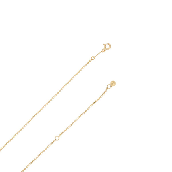 Collar eslabón cruzado con dije liso motivo esfera firma Tiffany & Co. en oro amarillo 18 kilates.
