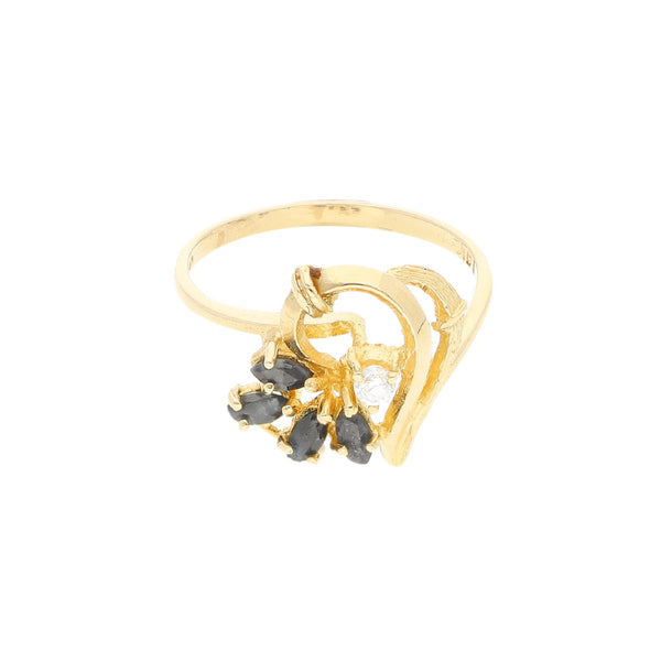 Anillo estilizado con sintéticos en oro amarillo 14 kilates.