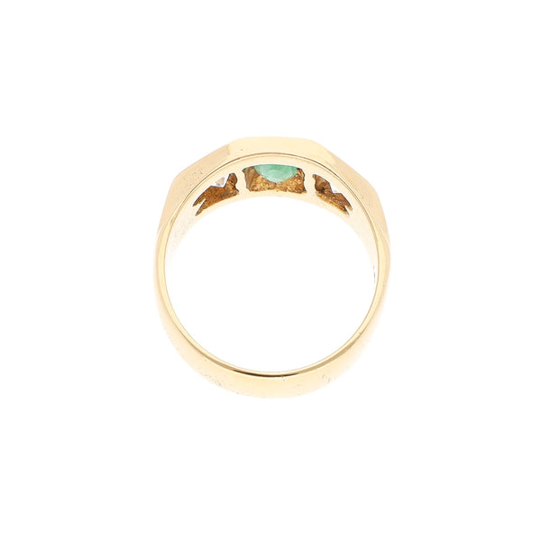 Anillo diseño especial con esmeralda y circonias en oro rosa 14 kilates.