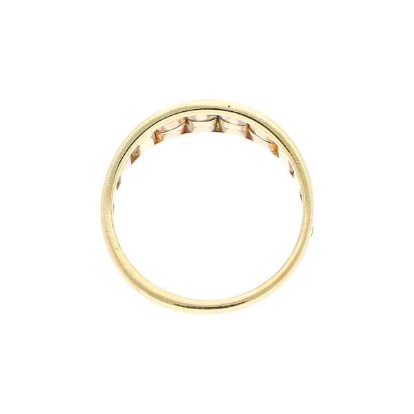 Anillo diseño especial en oro tres tonos 14 kilates.