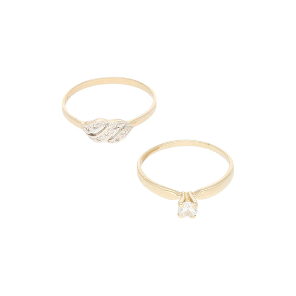 Dos anillos diseño especial con circonias en oro amarillo 14 kilates.