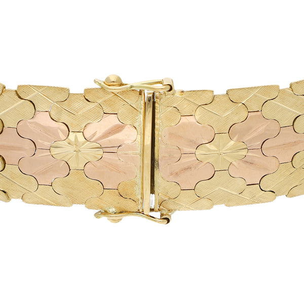 Pulsera eslabón articulado en oro tres tonos 18 kilates.