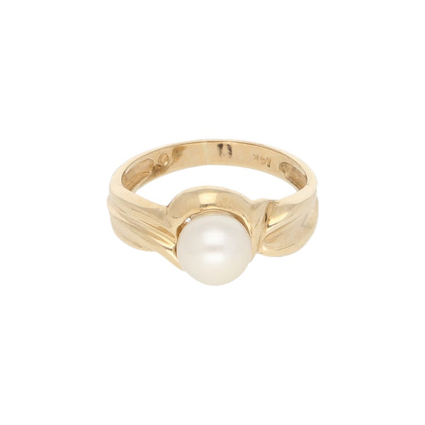 Anillo diseño especial con perla en oro amarillo 14 kilates.