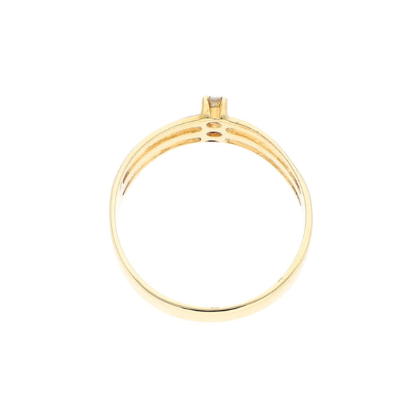 Anillo calado con circonias en oro amarillo 14 kilates.