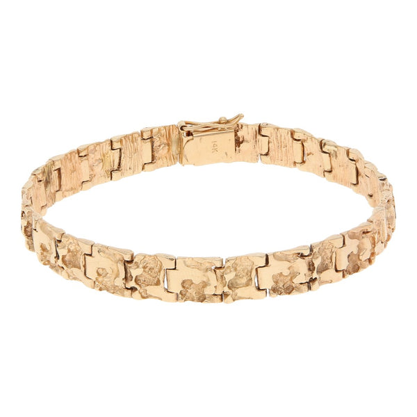 Pulsera eslabón articulado con en oro rosa 14 kilates.