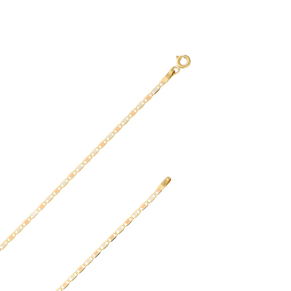 Collar eslabón nudo marino y dije hueco motivo bolso en oro tres tonos 14 kilates.