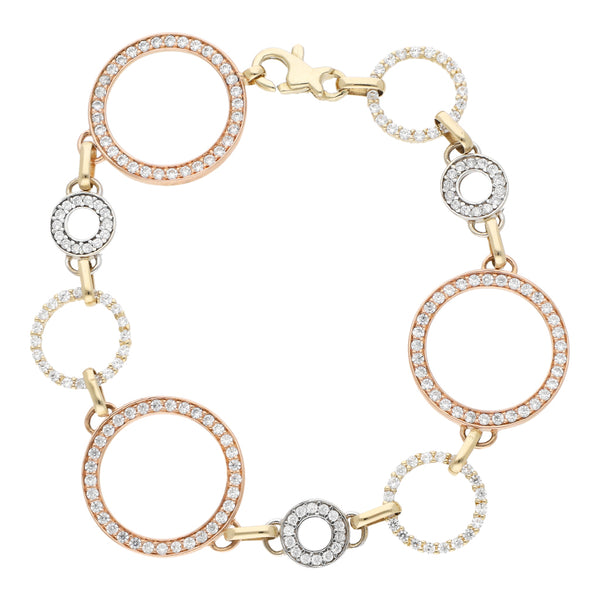 Pulsera eslabón articulado con circonias en oro tres tonos 12 kilates.