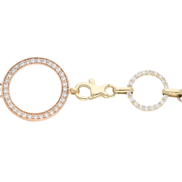 Pulsera eslabón articulado con circonias en oro tres tonos 12 kilates.