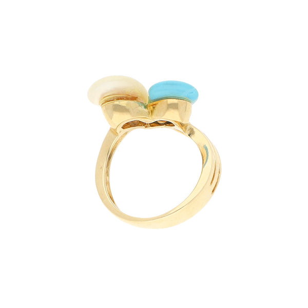 Anillo diseño especial con sintéticos en oro amarillo 14 kilates.