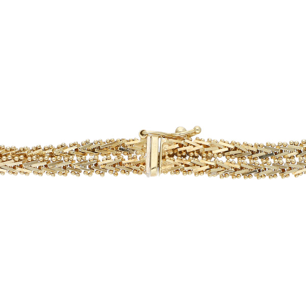 Pulsera de dos hilos eslabón boleado en oro tres tonos 14 kilates.