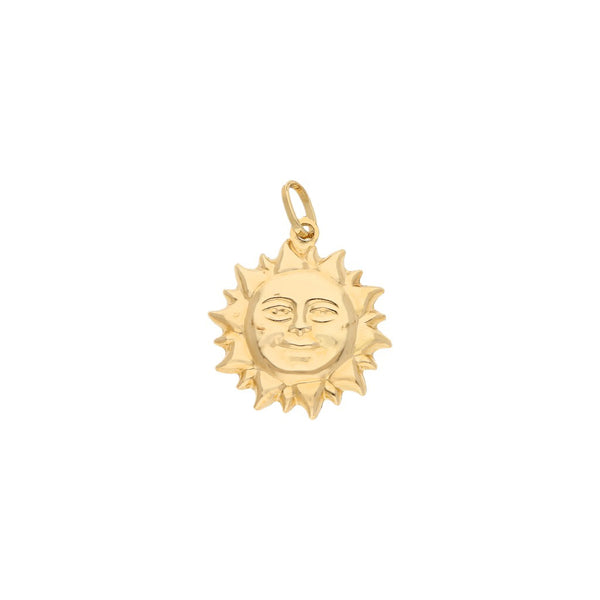 Dije diseño especial motivo sol en oro amarillo 14 kilates.