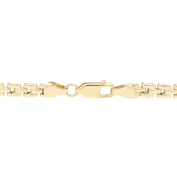 Pulsera eslabón articulado con aplicaciones motivo placa en oro amarillo 14 kilates.