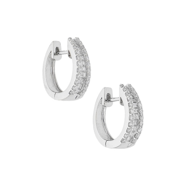 Arracadas articuladas con diamantes en oro blanco 18 kilates.