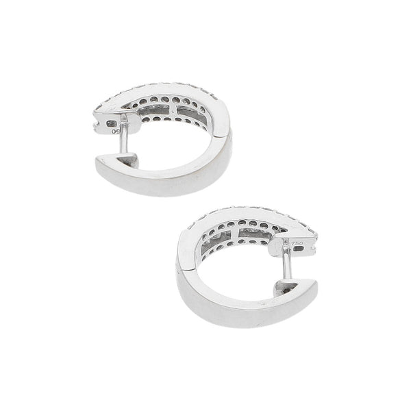 Arracadas articuladas con diamantes en oro blanco 18 kilates.