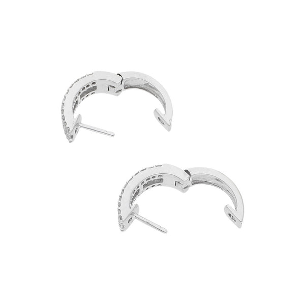 Arracadas articuladas con diamantes en oro blanco 18 kilates.