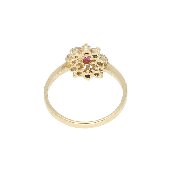 Anillo diseño especial con sintéticos en oro amarillo 14 kilates.