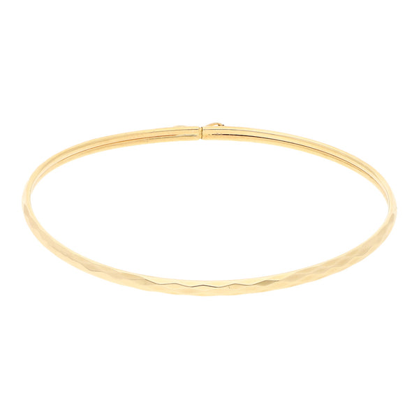 Pulsera de arillo facetada en oro amarillo 14 kilates.