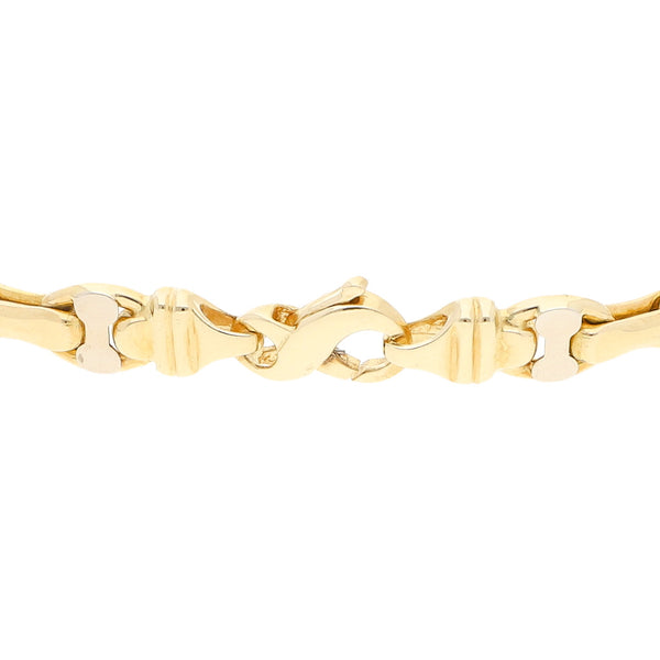 Pulsera eslabón articulado en oro dos tonos 14 kilates.