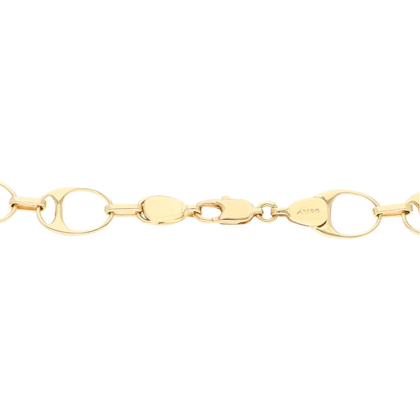 Pulsera eslabón combinado en oro amarillo 14 kilates.