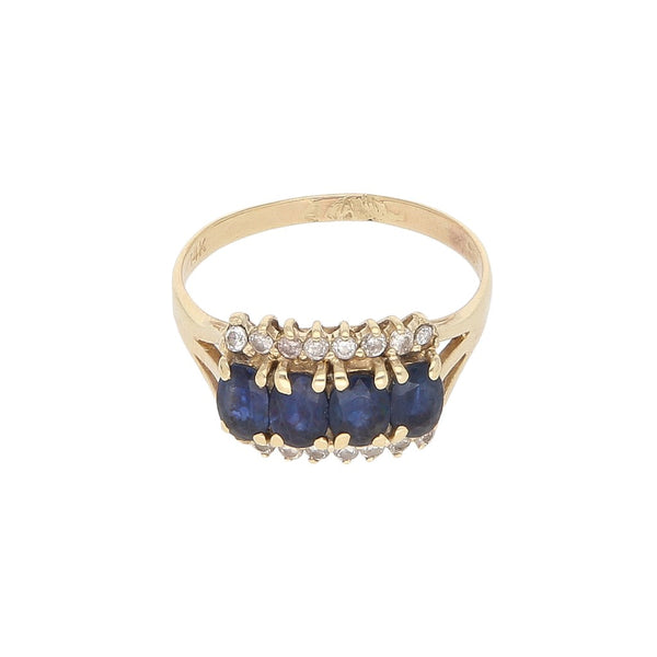 Anillo diseño especial con diamantes y sintéticos en oro amarillo 14 kilates.