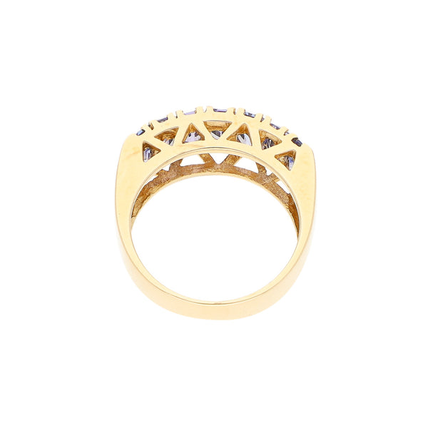 Anillo diseño especial con sintéticos en oro amarillo 14 kilates.