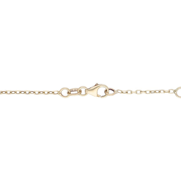 Pulsera eslabón cruzado con aplicación y sintéticos motivo ojo turco en oro amarillo 14 kilates.