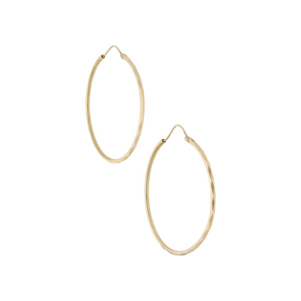 Arracadas facetas en oro amarillo 14 kilates.