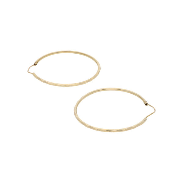 Arracadas facetas en oro amarillo 14 kilates.
