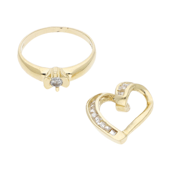 Anillo y dije diseño especial motivo corazón con circonias en oro amarillo 14 kilates.