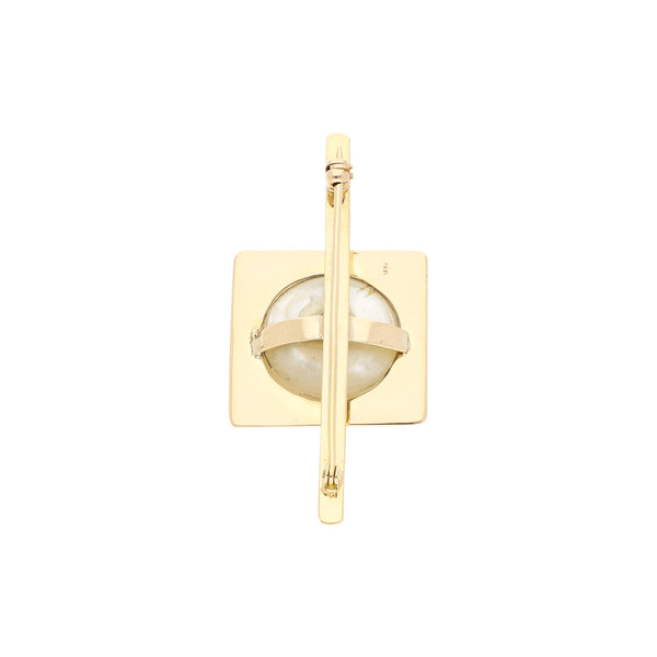 Prendedor diseño especial con perla en oro amarillo 14 kilates.