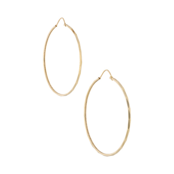 Arracadas facetadas en oro amarillo 14 kilates.