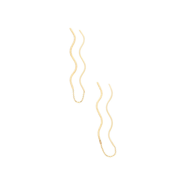 Aretes torzales en oro amarillo 14 kilates.