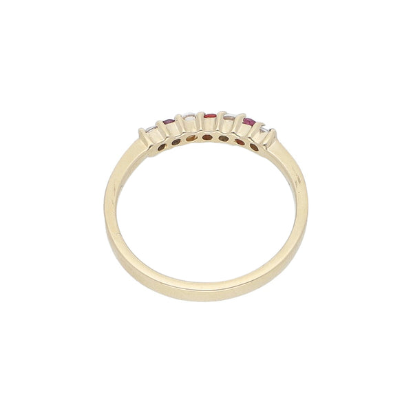 Anillo diseño especial con rubíes y circonias en oro amarillo 14 kilates.
