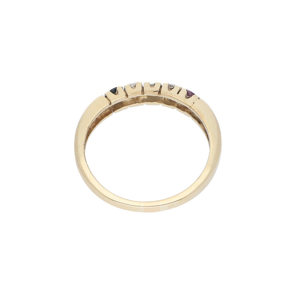 Anillo diseño especial con sintéticos en oro amarillo 14 kilates.