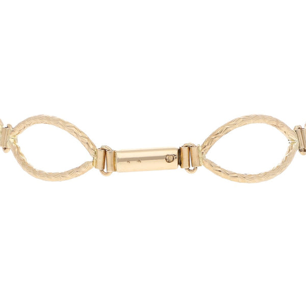 Pulsera eslabón articulado en oro amarillo 14 kilates.