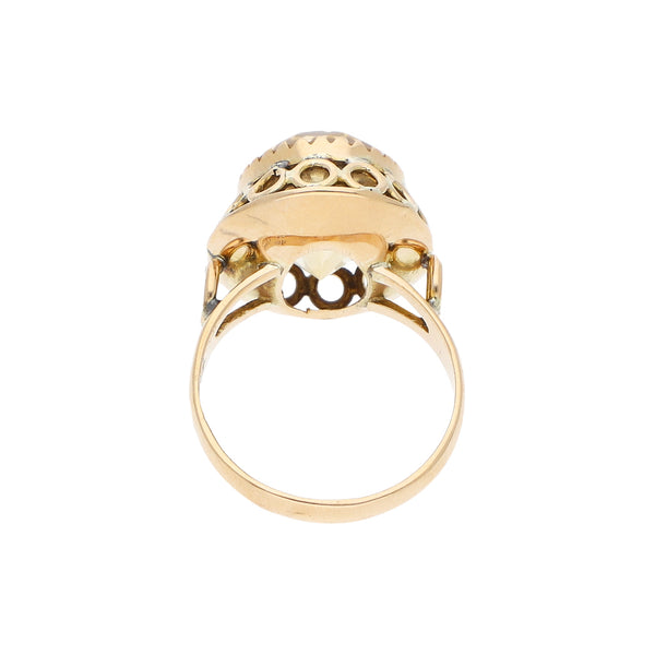 Anillo calado con sintético en oro rosa 14 kilates.