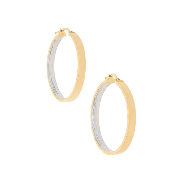 Arracadas huecas en oro amarillo 14 kilates.