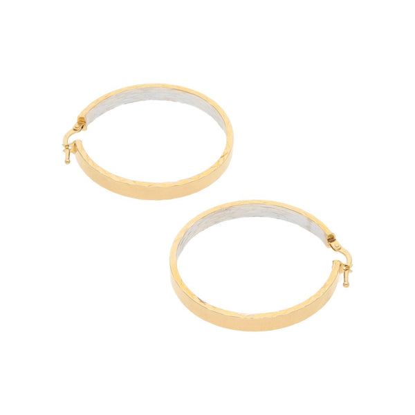 Arracadas huecas en oro amarillo 14 kilates.