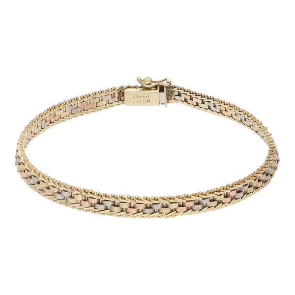 Pulsera eslabón barbado en oro tres tonos 14 kilates.