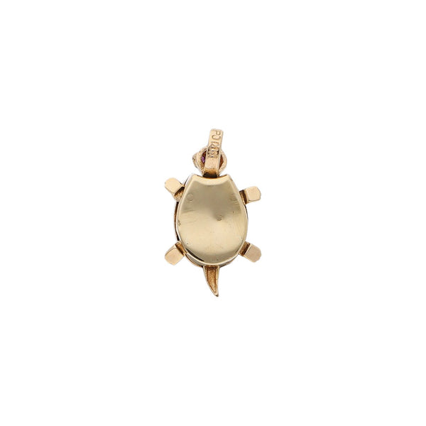 Dije diseño especial motivo tortuga con sintéticos en oro dos tonos 14 kilates.