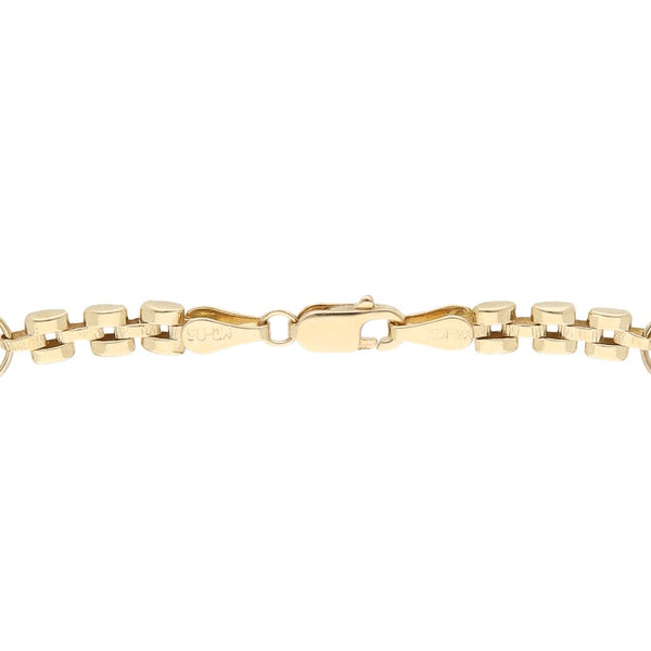 Pulsera infantil eslabón combinado en oro tres tonos 14 kilates.