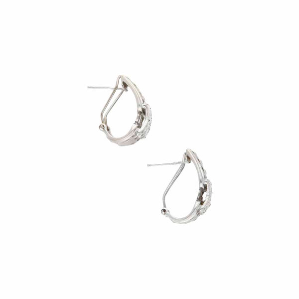 Aretes diseño especial con diamantes en oro blanco 14 kilates.