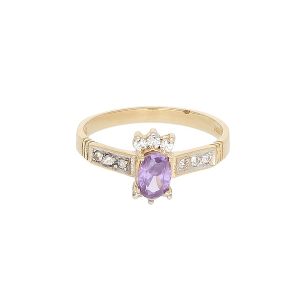 Anillo diseño especial con sintéticos en oro amarillo 14 kilates.