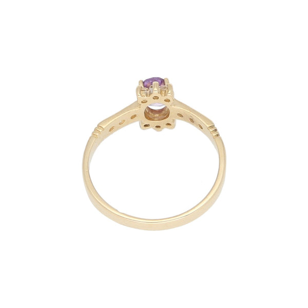 Anillo diseño especial con sintéticos en oro amarillo 14 kilates.